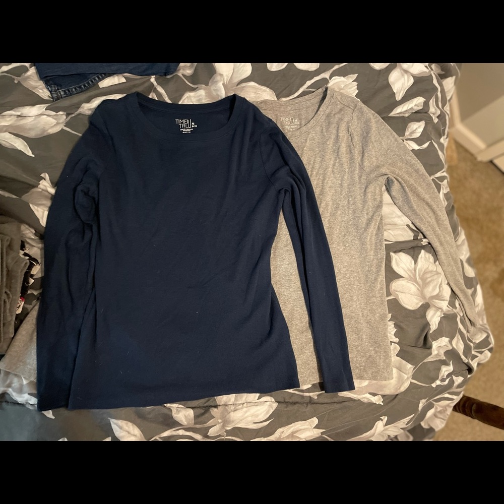 Two med long sleeve shirts